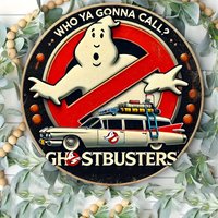 A vintage aluminum 'Ghostbusters' sign, featuring classic cartoon characters, perfect wall decoration