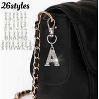 A cute and gorgeous mini alloy pendant keychain with 26 English letters, fully set with rhinestone