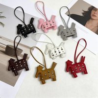 New double-sided studded horse bag charm, handmade leather warhorse creative car keychain pendant.