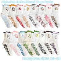 European sizes 36-43, 1 Pair of Mid-Calf Yoga Socks with Letter Embroidery and Dotted Rubber Soles for Woman