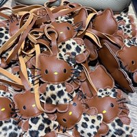 Anime Hello Kitty Black Leather Leopard Print Pendant Cute Pendant Rearview Mirror Pendant Doll Leather Keychain Decor Anime Toy