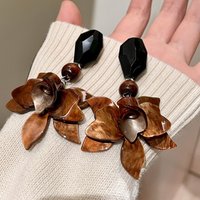 Retro-style oversized coffee-colored flower earrings