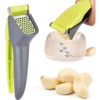 1 garlic press, a tool for crushing and squeezing garlic, a small household outdoor kitchen tool