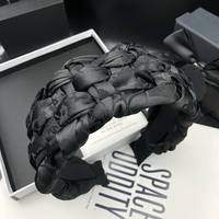 Black high-end hair clip for women with high skull top temperament, wearing a headband with wide edges and pressure