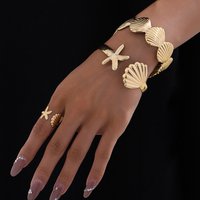 1 set of fashionable and fresh vacation metal ocean starfish shell bracelet ring set adjustable