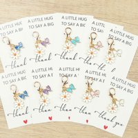5pcs/10pcs charming small butterfly keychain and flower keychain, accompanied by a thank-you card and decorative bag hangers.