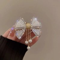 New bow hair clip for women, imitation pearl and rhinestone spring clip, light luxury high-end style hair accessory