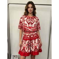 Holiday fashion two-piece suit printed round neck irregular top summer new high waist A-shaped fluffy skirt elegant women's suit