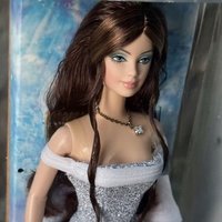 Genuine limited edition and out of print Barbie Avon Rose Splendor Barbie Spring Bouquet Limited Collection
