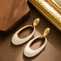 Wind enamel dripping oil hollow geometric oval earrings niche high-end sense big face slimming fashionable commuter earrings