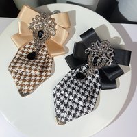 A Handmade Women's Plaid Black Diamond Tie, a Must-Have for the Back-To-School Season, Paired with Uniforms