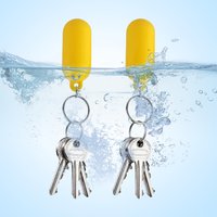 Waterproof Oval Hollow Plastic Beach Keychain with Floating Design for Water Rafting and Outdoor Activities