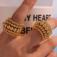 Nivora Minimalist 5 Layer Balls Women's Open Rings Stainless Steel Shiny Cast Gold Plated Statement Rings India Wedding Jewelry