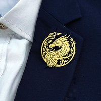 Metal costume brooch. Golden dragon stainless steel brooch. Universal chest emblem pin. A delicate and small gift.