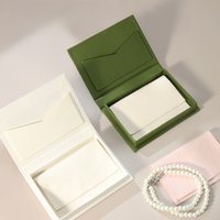 Magnetic flip book style jewelry box with embossed gold stamping process
