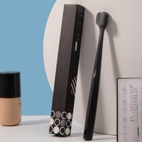 A single adult 10,000-bristle toothbrush premium toothbrush