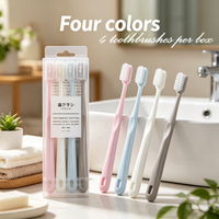 Four-color macaron toothbrush, with a built-in brush cap, waterproof packaging, and a built-in hook; features soft bristles.