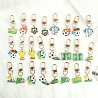 12pcs/24pcs soccer-themed keychain sets – an ideal gift for friends, perfect for decorating bags and accessories.