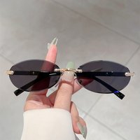 New Fashion Rimless Elliptical Small Frame Sunglasses European and American Trendy Web Celebrity Style Advanced Sense Shades