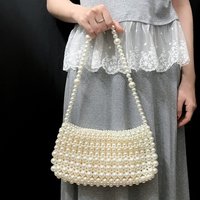 New women's high-end imitation pearl handbag armpit bag, fashionable and simple style woven crossbody handmade pearl bag