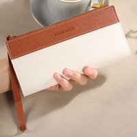 Fashionable women's wallet with contrasting colors; long tassel design; multi-card holder; solves the problem of coins being dif