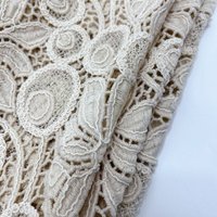 High-end laser cotton thread embroidery water-soluble milk silk hollow embroidery fabric in beige women's clothing fabric
