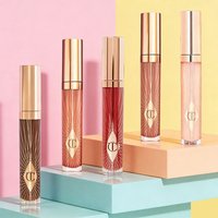 Hot Sale Charlotte Tilbury Multicolored Water Light Collagen Lip Gloss Moisturize Lip Balm Heart-shaped Tip Lip Brush Cosmetics