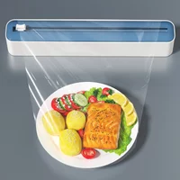 2-in-1 Plastic Wrap & Foil Dispenser with Slide Cutter - Durable Kitchen Organizer with Suction Cup Base for Home Use