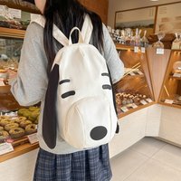 A new cute puppy backpack junior high school students 2025 niche large-capacity backpack for going out and traveling