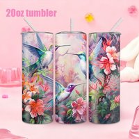 1pc 20oz straw water bottle, featuring a design of three hummingbirds flying among flowers, made of insulated stainless steel.