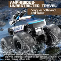 Q213 RC Cars Metris Amphibious 4WD Drive Big Foot Car with Water Cannon Function Waterproof Stunt Climbing Off-Road Vehicle Toys