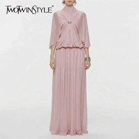 TWOTWINSTYLE Solid Spliced Metal Buckle Dresses for Women O Neck Cloak Sleeve High Waist Folds Elegant Dress Female Fashion 2026