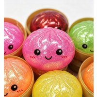 Cute Cartoon Expression Golden Powder Bun Squeeze Toy Blind Box Stress Relief Pull Fun Simulation Xiaolongbao Fidget Toy