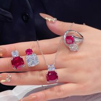 Luxurious red corundum pendant necklace for women - A set of cultivated synthetic ruby jewelry for a fashionable evening event