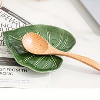 A ceramic spatula holder - kitchen countertop spoon holder - cute leaf design, multifunctional cutlery holder