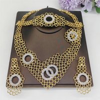 African Costume Jewelry Sets Gold Color Crystal Wedding Women Bridal Accessories nigerian Flower Pattern Necklace Set