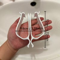 2pcs toilet seat stabilizer. Try this toilet stabilizer quickly, it can easily align the toilet without running.