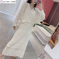 French fashion knitted hollow out set with V-neck pullover jacquard top and slim knit skirt two-piece set