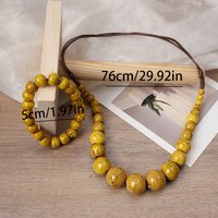 A set of Bohemian-style vintage ceramic necklaces and bracelets, suitable for both daily wear and formal occasions.