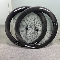 Zestaw kół z włókna węglowego do roweru szosowego o specjalnej fakturze, 45-50-55-65 mm, z mechanizmem zapadkowym 60T, piastą HG / XDR i hamulcami tarczowymi Center-Lock.