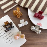 Acetate Bow Claw Clip โ Small Shark Clip for Half-Up Styles and Updos; Sophisticated Hair Accessory