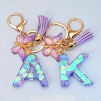 Fashion 26 Initial A to Z Letter Blue Shiny Resin Keychain Purple Butterfly Tassel Pendant Keyring for Women Men Car Key Holder