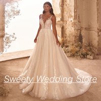 Exquisite Wedding Dress with Sparkling Sequined Applique Sheer Scoop Neck Sleeveless Open Back Sweep Train Bridal Dresses