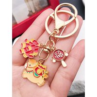 New Year Lucky Horse Keychain: Adorned with Lucky Money Bag and Lantern motifs. A portable talisman to carry good fortune with y