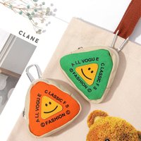 The new outdoor portable storage bag with contrasting colors, coin key bag, loose change, earphone bag, schoolbag and pendant