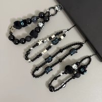 Black owl ins pendant stars phone lanyard for iphone 17 promax airpods pro 3 plush bracelet anti loss rope