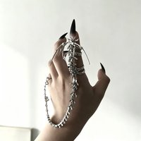 Punk Gothic Totenkopf-Handfessel Subkultur Skelett Integrierte Kette Langer Fingerring Unisex Modeschmuck