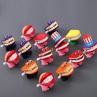 1pcs Clockwork Toy Upper Chain Jumping Tooth Toy Jump Teeth Running Clockwork Spring Wind Up Toy