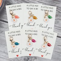 6pcs/12pcs creative daisy flower and leaf keychain, stylish casual pendant, leaf motifs for decoration. An ideal gift for friend