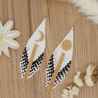 Rice bead earrings Tassel Symmetry Sun Moon Design Originality Hand knitting Bohemia Alloy Fashion Simple Beaded earrings